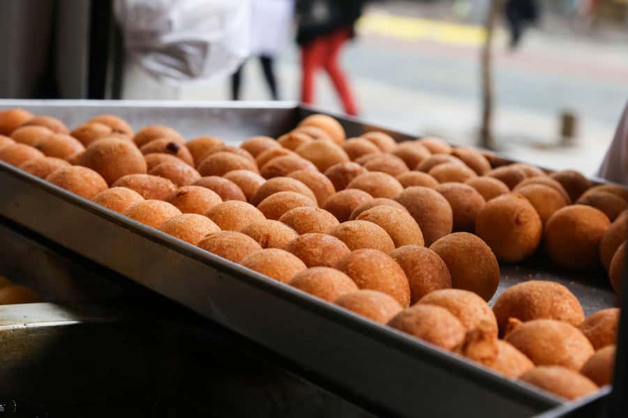 Bogota Food Tour with over 12 Tastings & Tejo - Tamales, hot chocolate, and a restaurant with history