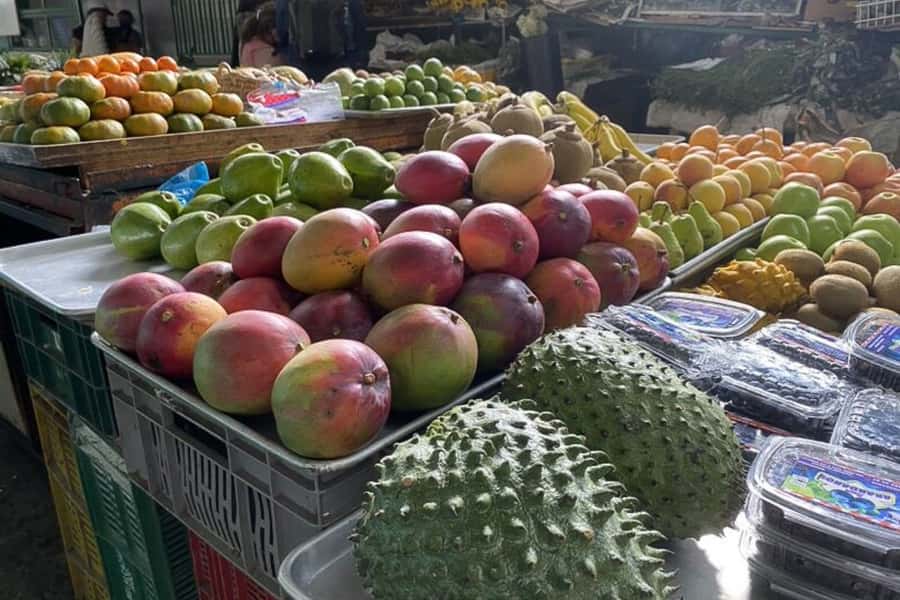 Cali: Fruit Market Walking Tour with Tastings - Meeting your guide at La Palmera Hostel