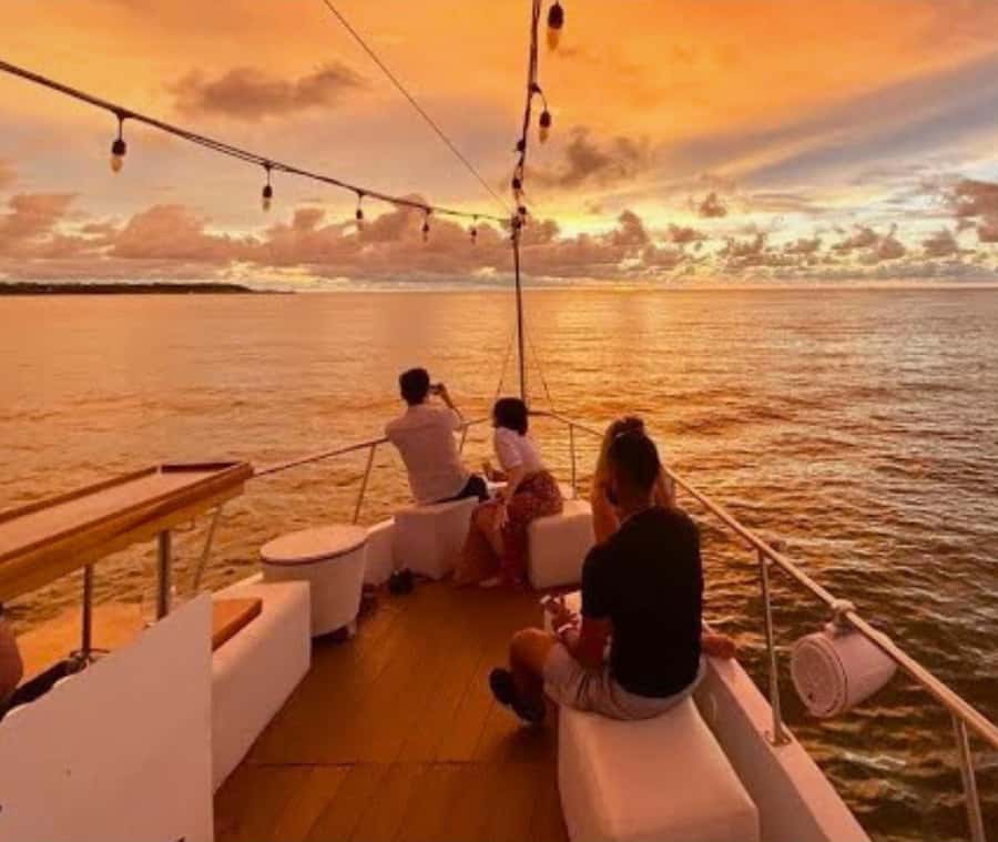 Cartagena de Indias: Sunset Cruise Open Bar with Dance Show - Cartagena Bay at sunset, with a dance floor on deck