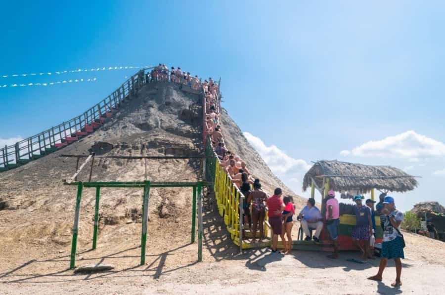 Cartagena: Mud Volcano Tour with Lunch, Pool, and Beach - Entering the volcano in a swimsuit and sandals