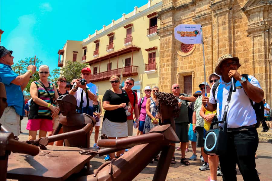 Cartagena: Shared Walking Tour of the Colonial Old Town - Public squares where history meets daily life
