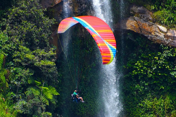 Fun RAFTING + Awesome PARAGLIDING over giant waterfalls from MEDELLIN - From Medellín to Cocorná at 9:30 am