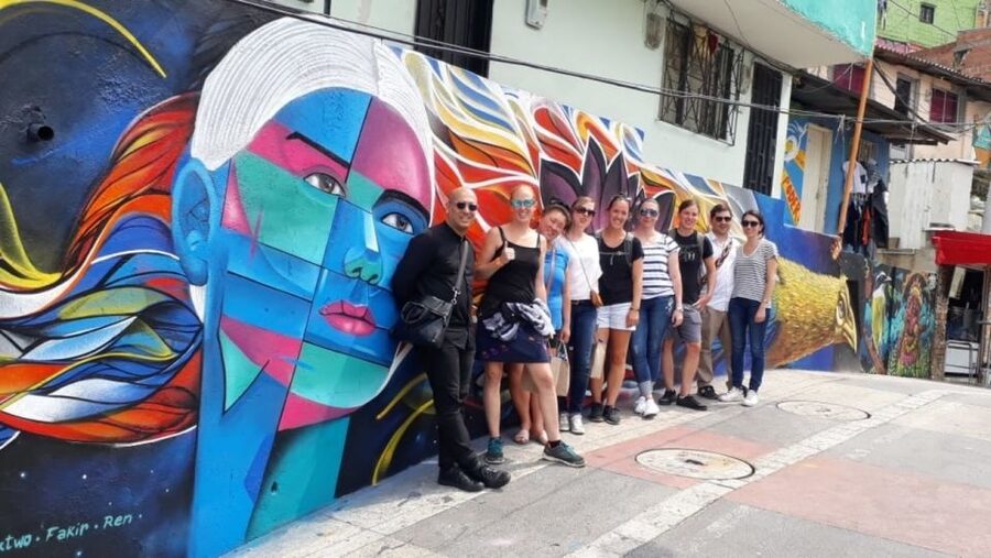 Medellín: Comuna 13 District Tour with Cable Car Ride - Electric escalators and the climb uphill