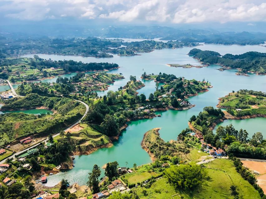 Medellin: Guatapé Day Trip & Boat to Pablo Escobar's Estate - Peñol Rock: climb it or admire it
