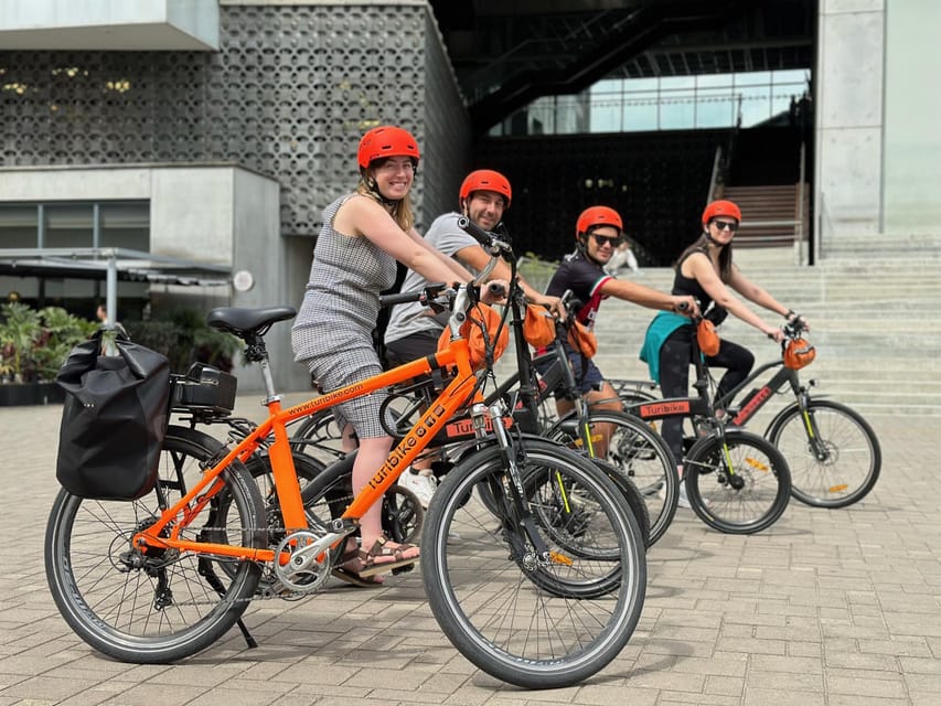 Medellín: History & Local Life Essentials Tour on an E-Bike - Perpetuo Socorro and the route through change