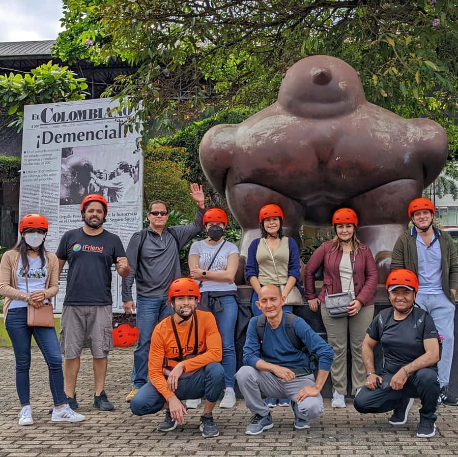 Medellín: History & Local Life Essentials Tour on an E-Bike - Riding beneath the metro and into central Medellín