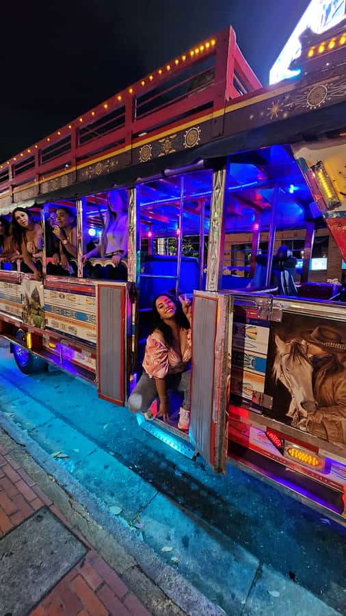Medellin: Party Bus with DJ & Street Food Tastings - Empanadas and arepas give the night a local flavor