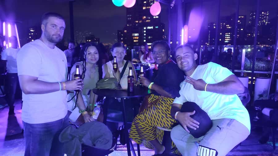 Medellin: Street Food and Poblado Rooftop Tour with a Local - Starting at Poblado Park with a local guide